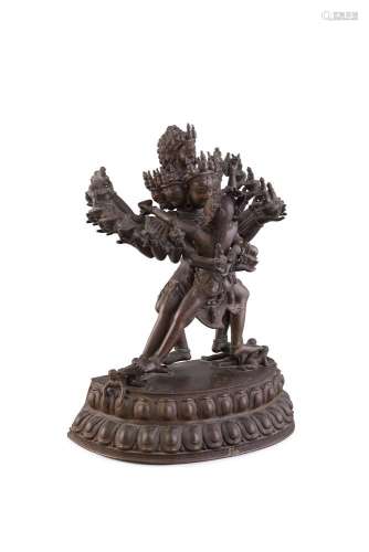 A BRONZE GROUP DEPICTING HEVAJRA AND NAIRATMYA, 19th Century, cast with Hevajra embracing his