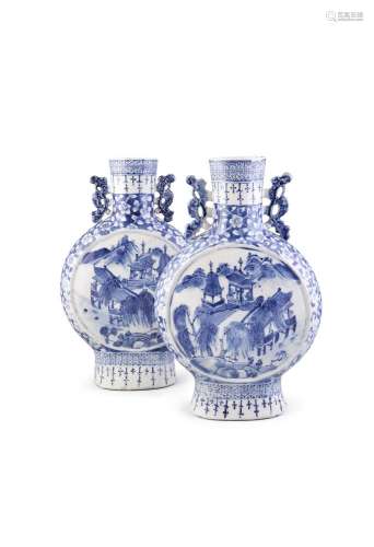 A PAIR OF BLUE AND WHITE MOON FLASKS, 19th century, of flattened circular shape, with cylindrical