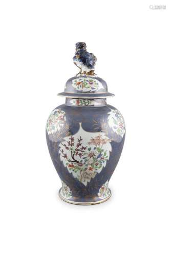 A LARGE OVOID BLUE GROUND ENAMELLED VASE AND COVER, 19th century, surmounted with a qilin and