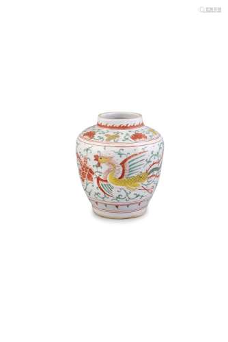 A 'PHOENIX AND PEONY' JAR, SHUNZHI (1644-1661) of ovoid form painted with a phoenix in mid-flight