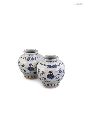 A PAIR OF BLUE AND WHITE OVOID JARS, Early 17th Century each with waisted neck and lipped rim,