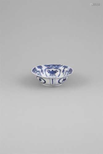 A LATE MING BLUE AND WHITE BOWL, 16th century, with everted rim, the side walls decorated with
