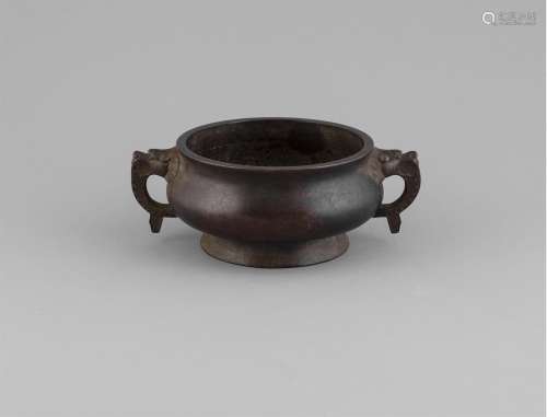 A BRONZE CENSOR, 17/18TH CENTURY, of squat bulbous form, cast with animal masks side handles over