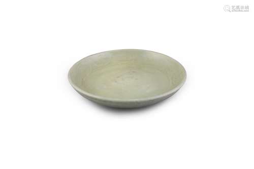 A LARGE LONGQUAN CELADON DISH, YUAN/MING DYNASTY, of simple circular shape, with raised sides