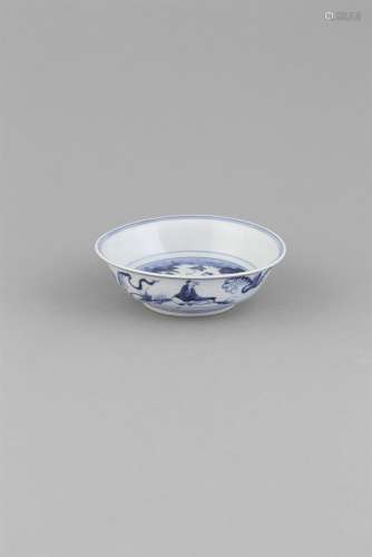 A RARE BLUE AND WHITE BOWL, TIANQI (1621-1627), of broad circular shape, painted to the central