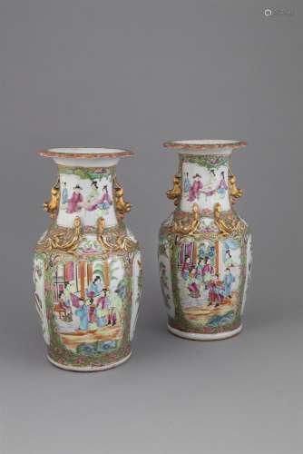 A PAIR OF 'CANTON' EXPORT BALUSTER SHAPED VASES, in traditional palette, with out turned rim and