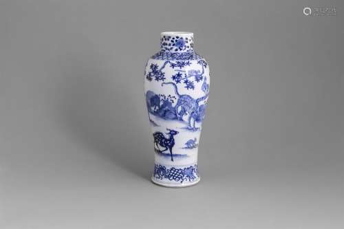 A 19TH CENTURY BLUE AND WHITE BALUSTER VASE, the broad frieze painted in vivid blue, with tiger,