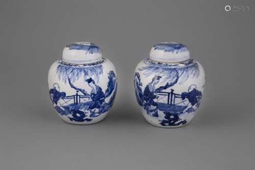 A PAIR OF 19TH CENTURY BLUE AND WHITE GINGER JARS AND COVERS, each painted with figures in garden