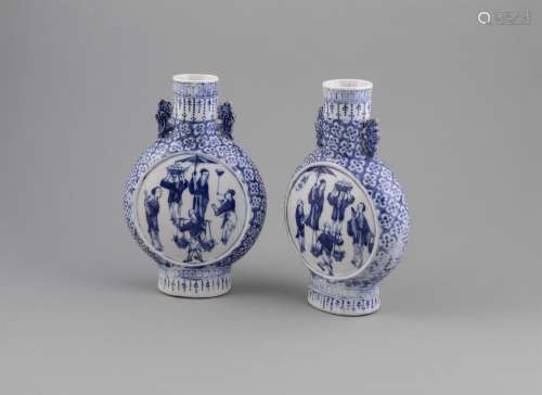 A PAIR OF BLUE AND WHITE MOON FLASKS, 19th century, each of flattened circular shape with