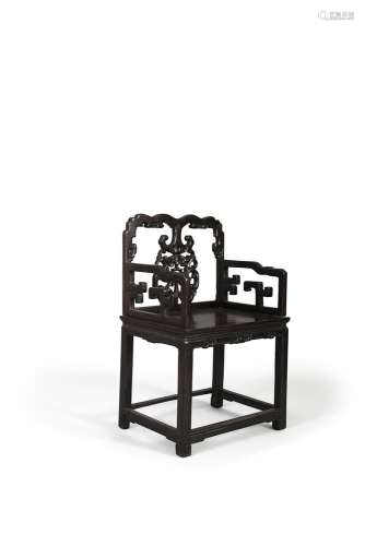 A HARDWOOD CHAIR, 19th Century, probably blackwood, with pierced back of fruiting boughs, stylised