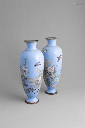 A LARGE PAIR OF JAPANESE CLOISONNE VASES, c. 1900, of slender oviform shape, inlaid in various