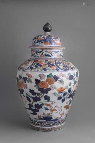 AN ARITA IMARI PATTERN OVOID VASE AND COVER, Genroku period, c.1700, decorated in iron-red