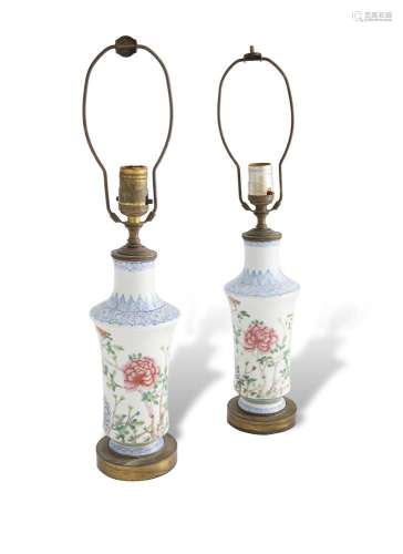 A PAIR OF FAMILLE ROSE PORCELAIN TABLE LAMPS, late 19th/ early 20th century, each of baluster