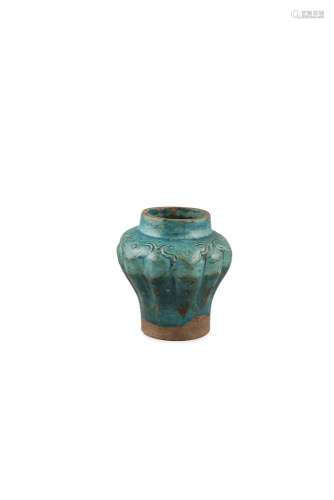 A TURQUOISE GLAZED POTTERY VASE, possibly Ming, of lobed circular form, moulded with a continuous