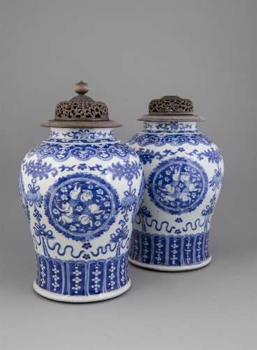 A PAIR OF BLUE AND WHITE BALUSTER SHAPED VASES AND COVERS, 19th century, each with detatchable