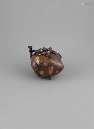 A GILT BRONZE 'PEACH' CENSER AND COVER, 17th century, the detatchable circular cover cast with