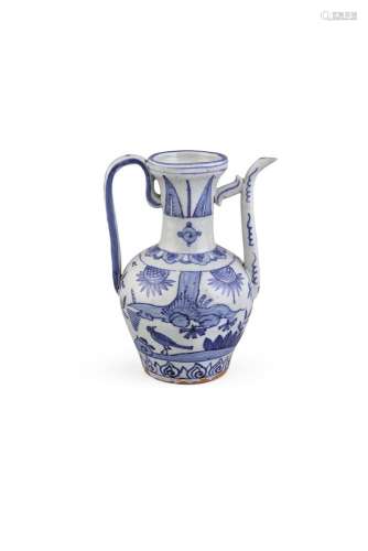 A BLUE AND WHITE EWER, C.1600 following a middle eastern shape, with baluster shaped body applied