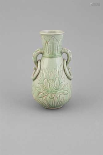 A LONGQUAN CELADON GLAZED VASE, 16th Century of pear shape with flared neck and lipped rim,