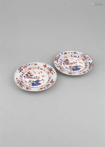 A PAIR OF CHINESE IMARI DISHES, 18th Century, each painted with bamboo, lotus and rockwork groups