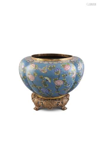 A LARGE 19TH CENTURY CLOISONNE BOWL, Qing Dynasty (1644 - 1911), of lobed form with gilt metal rim