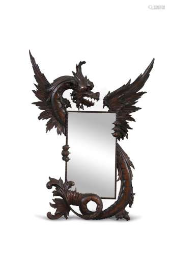 A LATE 19TH CENTURY CARVED HARDWOOD 'DRAGON' MIRROR, modelled in the Chinese taste, attributed to