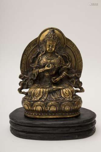 Brass Buddha Seated on a throne with a double row...