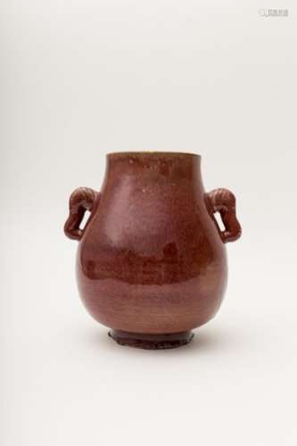 Hu vase Oxblood porcelain, with elephant handles....