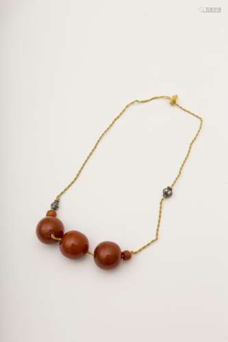 Necklace with three amber beads Gadrooned clasp. ...