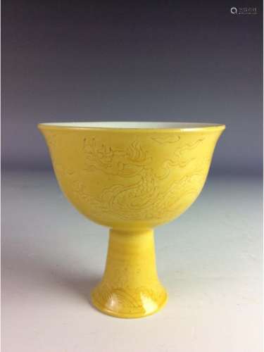Chinese yellow glaze stem cup with engraving dragon motif.