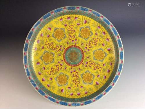 Chinese porcelain plate with peach and floral patterns.