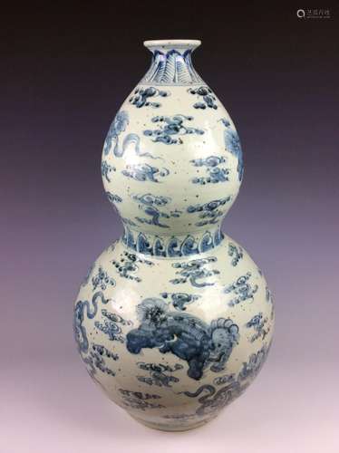 Chinese double gourd bottle vase with lions.