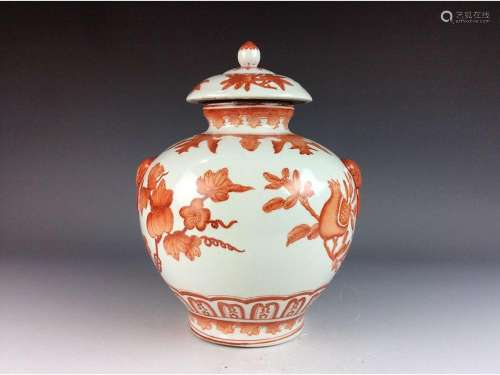 Chinese porcelain pot with lid, red glazed, decorated