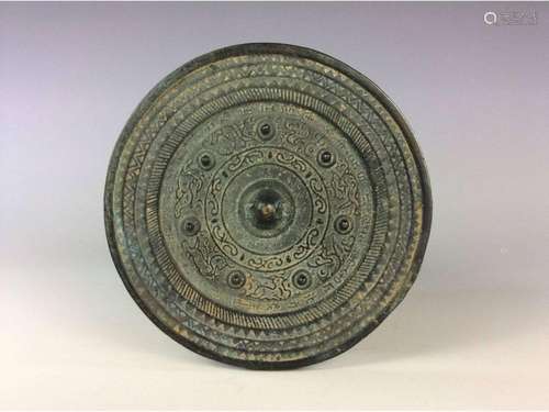 Chinese bronze mirror.