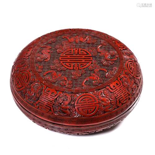 Cinnabar lacquer box and cover Chinese, 19th/20th Century of cushion form carved with long life