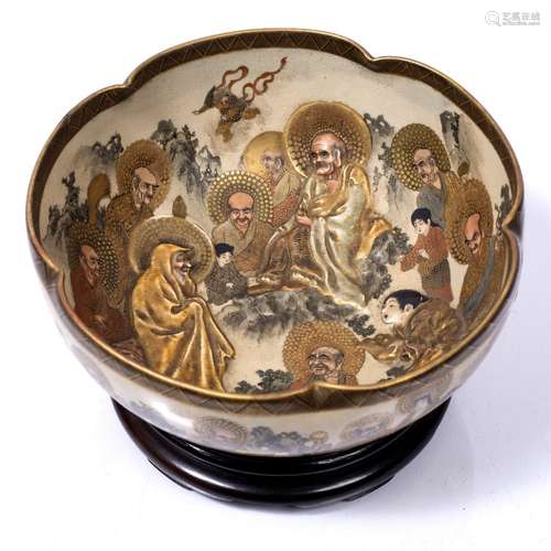 Satsuma bowl Japanese, Meiji depicting Sennen Buddhist and other characters, signed, on a hardwood