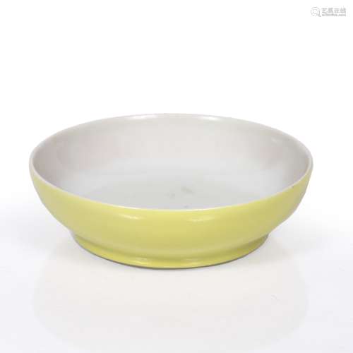 Small yellow dish Chinese, 19th century of simple form,Qianlong mark to base 9cm across