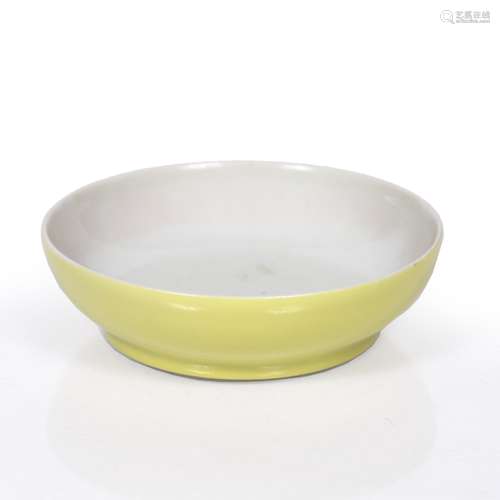 Small yellow dish Chinese, 19th century of simple form,Qianlong mark to base 9cm across