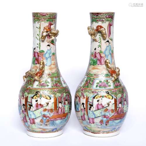 Pair of Canton vases Chinese, 19th Century of bottle form with typical panels painted with figures