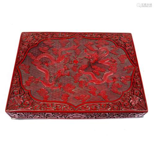 Large Cinnabar rectangular box Chinese, late 19th/early 20th Century carved with two dragons, clouds