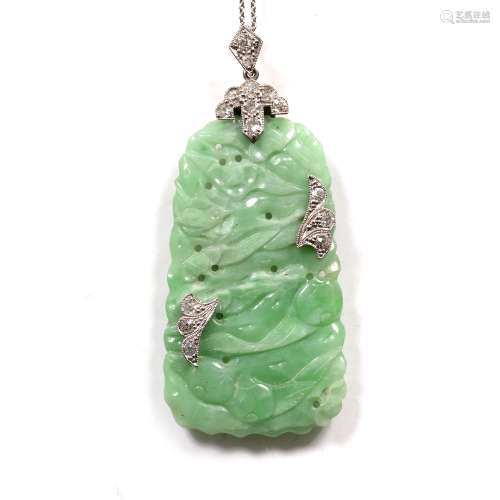Jade pendant Chinese the light apple green stone mounted with platinum and diamonds ,retailed by
