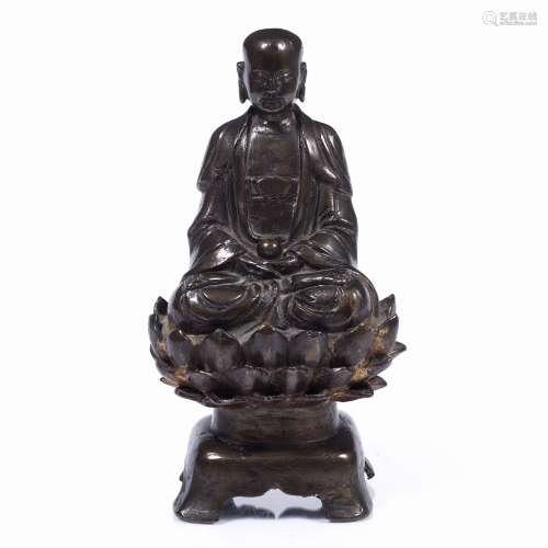 Bronze Buddha Chinese, 17th Century the figure part gilded and seated on a lotus 23.5cm