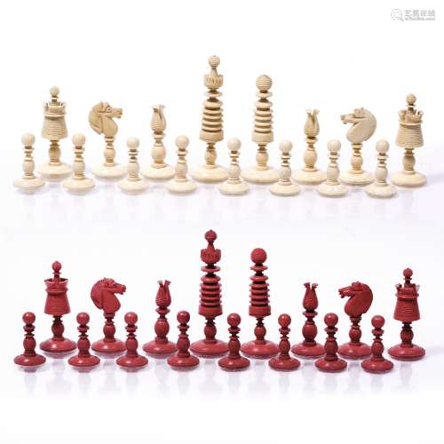 Stained ivory chess set Chinese, 19th Century of turned form