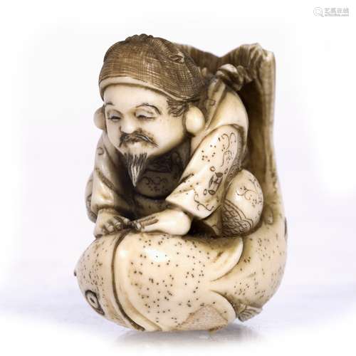 Ivory netsuke of Ebisu Japanese, late Meiji seated upon and calming a large Tai fish from the