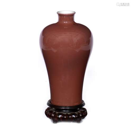 Monochrome peach Meiping vase Chinese, 19th Century with hardwood stand 20cm high