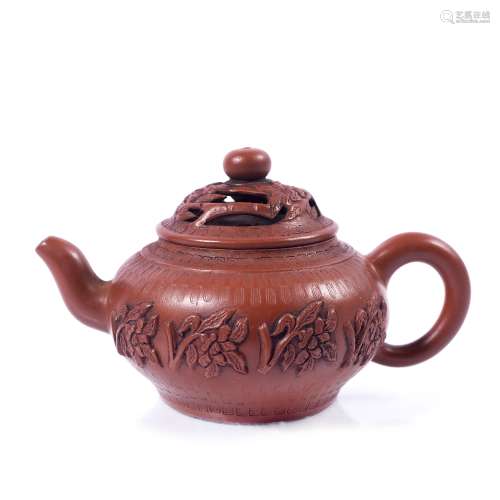 Yixing teapot Chinese, 19th/early 20th Century having pierced cover, raised foliate designs, seal