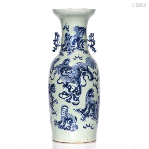 Large celadon vase Chinese, 19th/20th century decorated with kylins in blue relief, with two dog