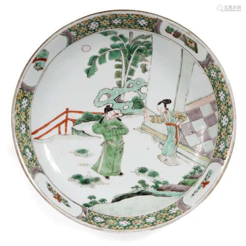 Porcelain famille vert saucer dish Chinese, Kangxi 1662-1722) centrally decorated with a gentleman