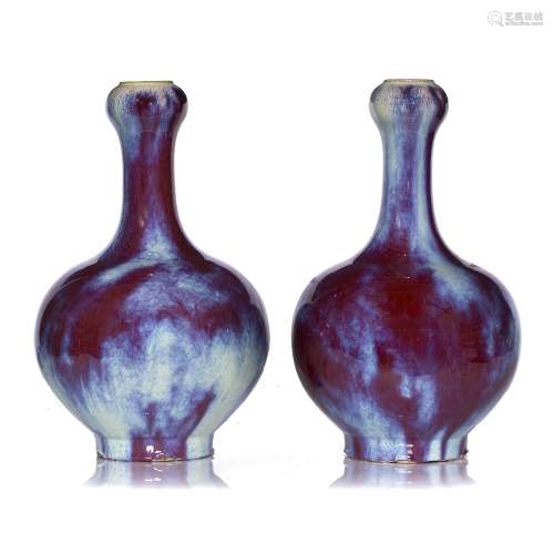 Pair of Sang de bouef vases Chinese, late 19th Century the vases having garlic shaped necks 39cm
