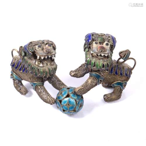 Pair of filigree and enamel miniature temple dogs Chinese, 19th Century each attached to a turquoise