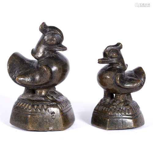 Two bronze opium weights Nepalese each of bird form on an hexagonal base 5cm high